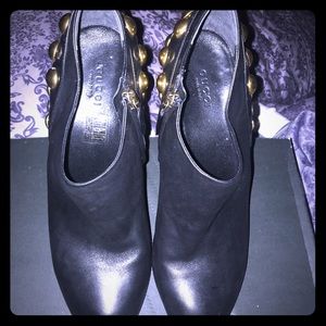 Gucci gold studded black leather shoe bootie.
